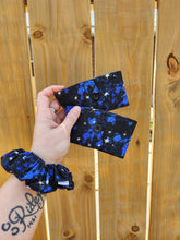 Load image into Gallery viewer, blue and black starry sky drink cozies and scrunchie