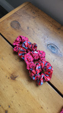 Load image into Gallery viewer, red and blue berry patterned scrunchie hair accessory. beside watermelon seeds print scrunchies
