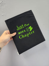 Load image into Gallery viewer, black book sleeve with green just one more chapter design