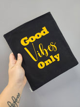 Load image into Gallery viewer, black book sleeve with yellow good vibes only design