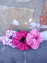 Load image into Gallery viewer, trio of pink scrunchies with various designs