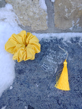 Load image into Gallery viewer, clear acrylic bookmark with design "just one more chapter" beside scrunchie