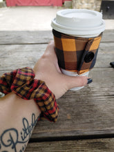 Load image into Gallery viewer, brown and red plaid scrunchie on wrist