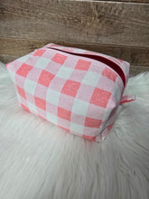 Load image into Gallery viewer, Pink and white checkered bag on a fluffy white surface
